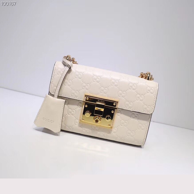 G*u*i top handle bags